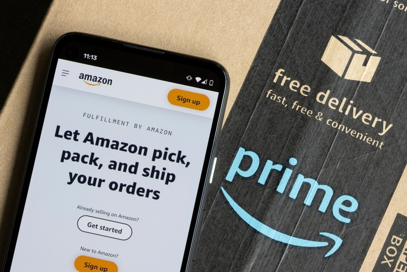 Amazon FBA page on a mobile phone with Amazon Prime background