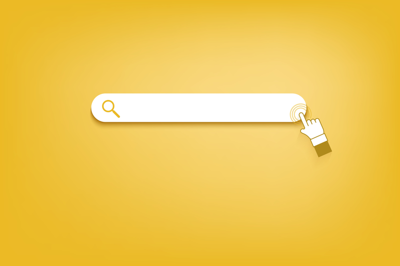 A search bar on a yellow background illustrating an seo keyword tool for amazon